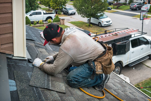Professional Roof Replacement technician working in Pomfret Center, CT